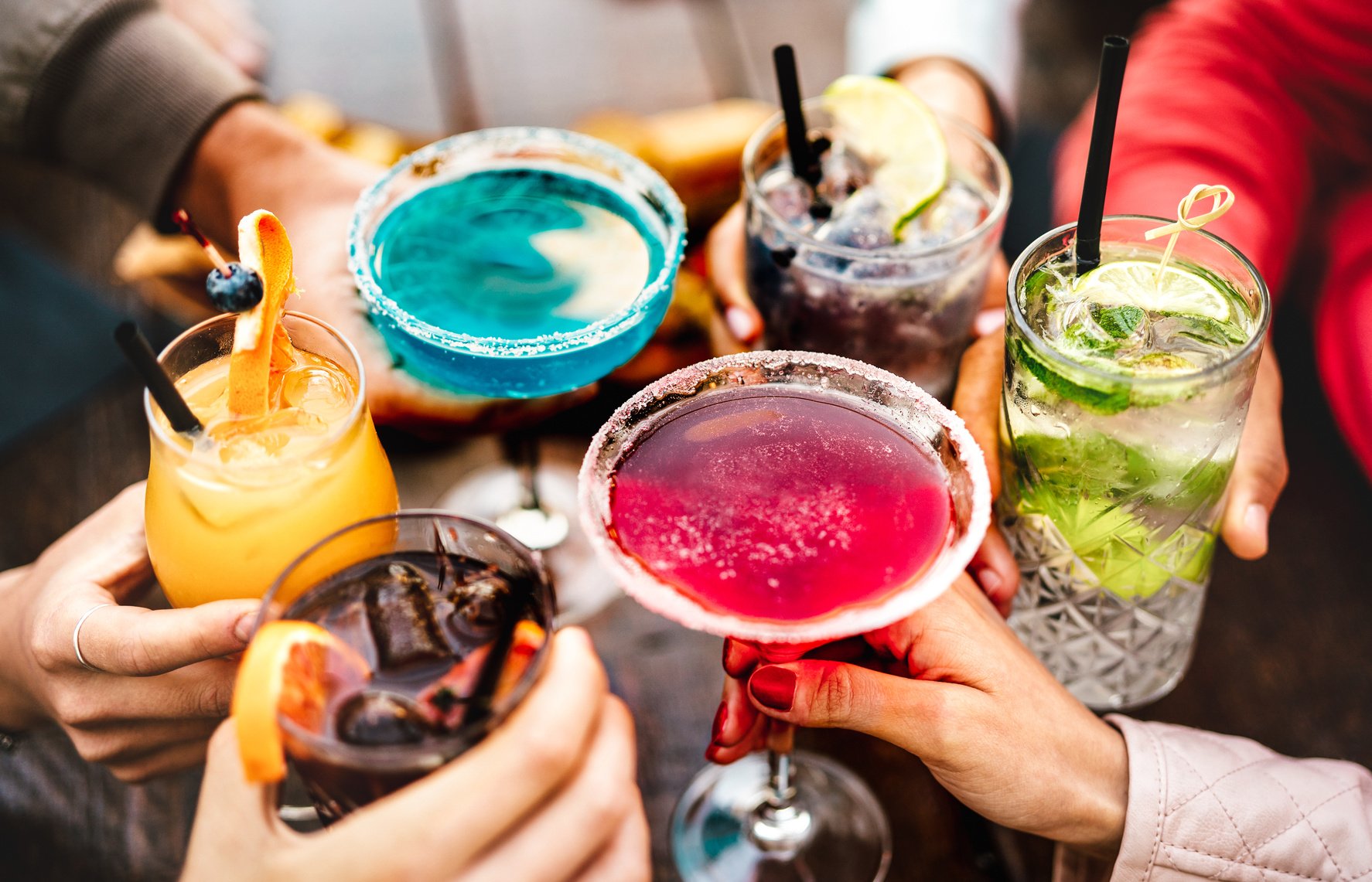 Group of People Toasting with Cocktails